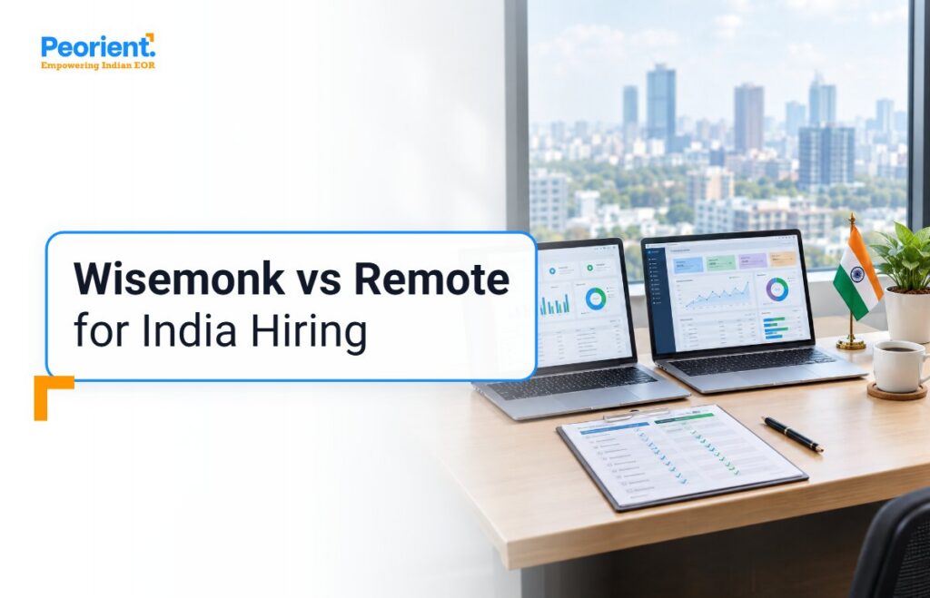Office desk with two laptops and a comparison sheet, illustrating Wisemonk vs Remote EOR costs for hiring in India